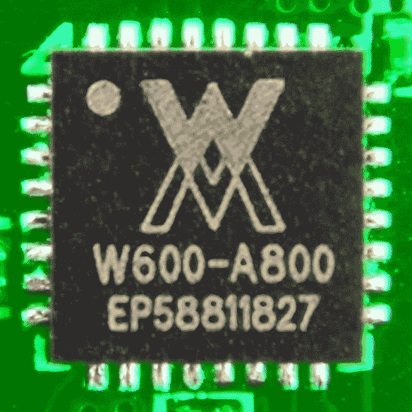 [Photo: W600 chip soldered onto a PCB]